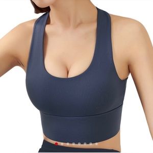 New without tags Women's Cross-Padded Adjustable
Sport bras. Navy blue color